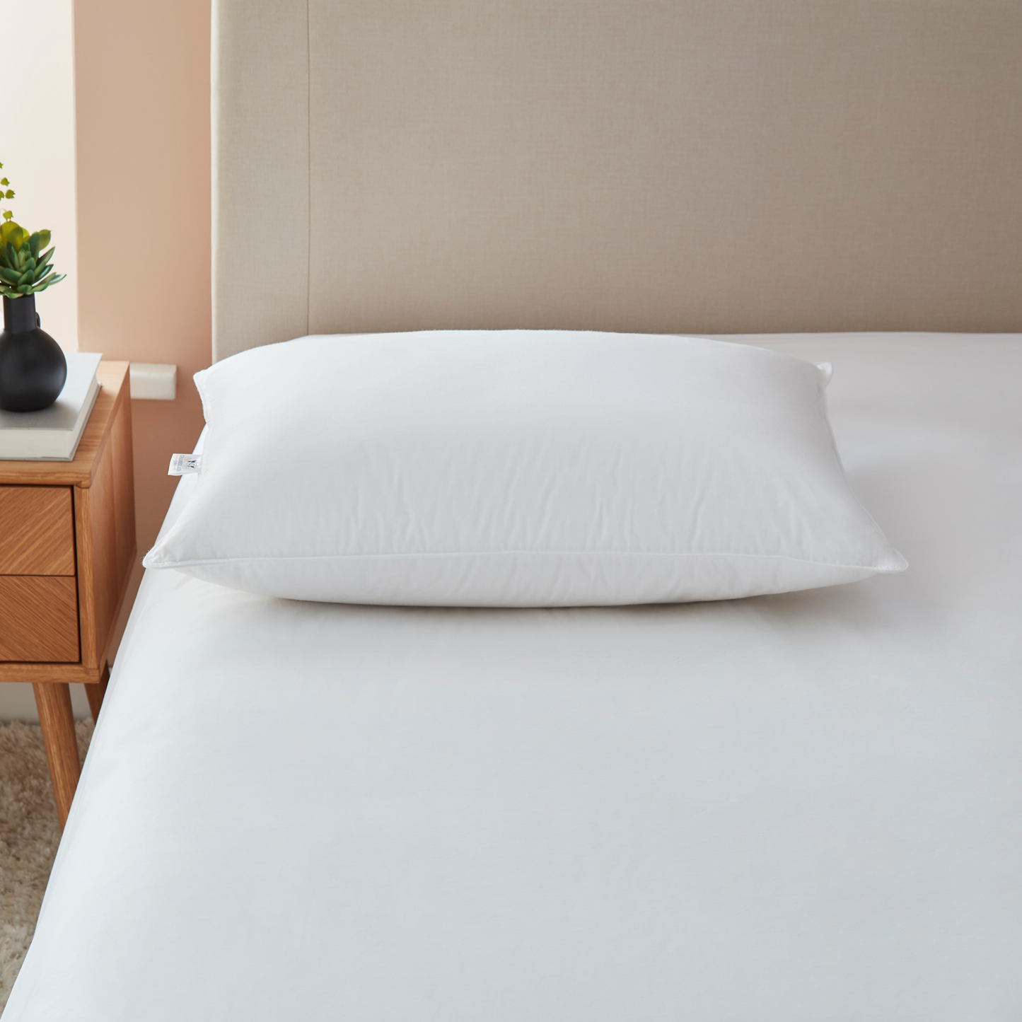 Chamberlain Down Pillow flat on bed