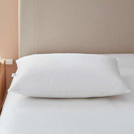 Chamberlain Down Pillow lying flat on bed